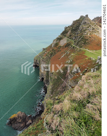 Steep sea cliffs and Rugged Jack from Castle Rock, Exmoor, Devon Steep sea cliffs and Rugged Jack from Castle Rock, Exmoor, Devon 142704601