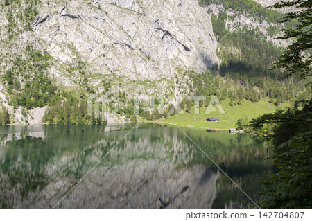 Fischunkelalm at lake Obersee, lake Konigssee, in the Berchtesgaden Alps, Bavaria, Germany Fischunkelalm at lake Obersee, lake Konigssee, in the Berchtesgaden Alps, Bavaria, Germany 142704807