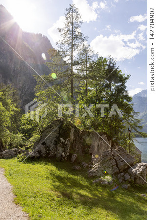 Picturesque view of lake Obersee, lake Konigssee, in the Berchtesgaden Alps, Bavaria, Germany Picturesque view of lake Obersee, lake Konigssee, in the Berchtesgaden Alps, Bavaria, Germany 142704902