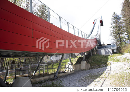 Ski flying hill at Lake Freibergsee in Bavaria, Germany Ski flying hill at Lake Freibergsee in Bavaria, Germany 142704933