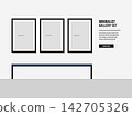 Minimalist Gallery Set with Three Black Photo Frames on White Wall Mockup 142705326