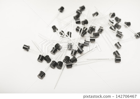 Black plastic photodiodes in packaging. Phototransistors. Semiconductor devices. Black plastic photodiodes in packaging. Phototransistors. Semiconductor devices. 142706467