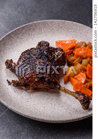 Duck leg confit roasted with salt and allspice. Duck leg confit Duck leg confit roasted with salt and allspice. Duck leg confit 142706919