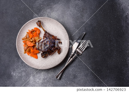 Duck leg confit roasted with salt and allspice. Duck leg confit Duck leg confit roasted with salt and allspice. Duck leg confit 142706923