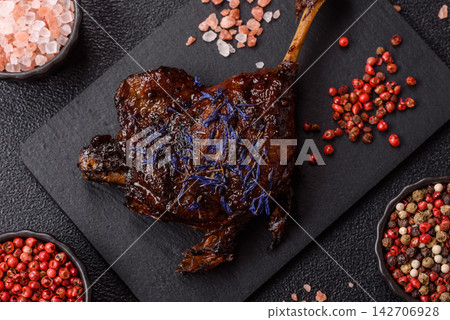 Duck leg confit roasted with salt and allspice. Duck leg confit Duck leg confit roasted with salt and allspice. Duck leg confit 142706928