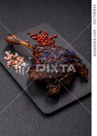 Duck leg confit roasted with salt and allspice. Duck leg confit Duck leg confit roasted with salt and allspice. Duck leg confit 142706932