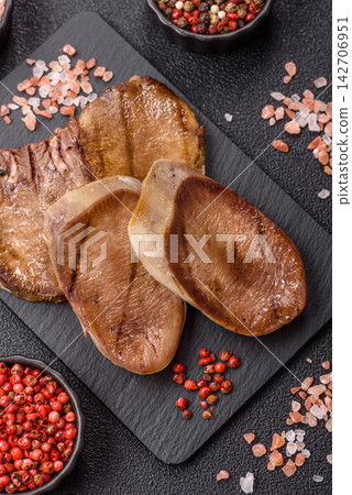 Slices of grilled pork or beef tongue seasoned with salt and allspice. Sliced beef tongue Slices of grilled pork or beef tongue seasoned with salt and allspice. Sliced beef tongue 142706951