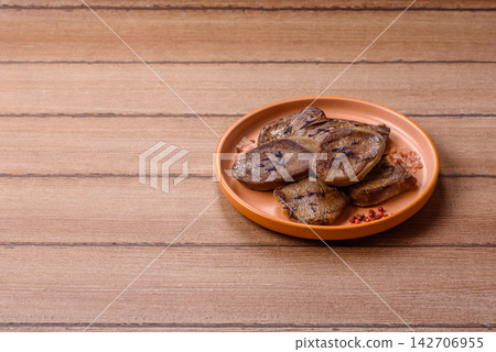 Slices of grilled pork or beef tongue seasoned with salt and allspice. Sliced beef tongue Slices of grilled pork or beef tongue seasoned with salt and allspice. Sliced beef tongue 142706955