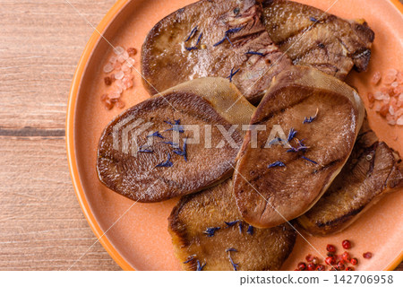 Slices of grilled pork or beef tongue seasoned with salt and allspice. Sliced beef tongue Slices of grilled pork or beef tongue seasoned with salt and allspice. Sliced beef tongue 142706958