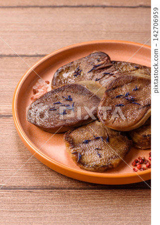 Slices of grilled pork or beef tongue seasoned with salt and allspice. Sliced beef tongue Slices of grilled pork or beef tongue seasoned with salt and allspice. Sliced beef tongue 142706959