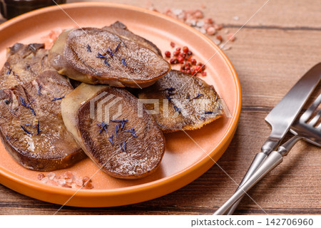 Slices of grilled pork or beef tongue seasoned with salt and allspice. Sliced beef tongue Slices of grilled pork or beef tongue seasoned with salt and allspice. Sliced beef tongue 142706960