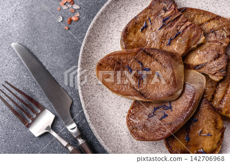 Slices of grilled pork or beef tongue seasoned with salt and allspice. Sliced beef tongue Slices of grilled pork or beef tongue seasoned with salt and allspice. Sliced beef tongue 142706968