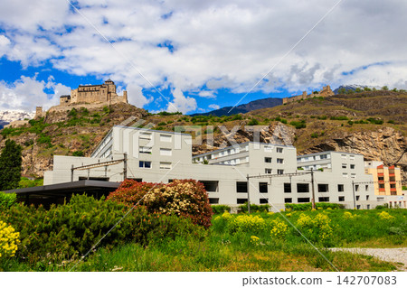 View of Tourbillon Castle and Valere Basilica in Sion, Switzerland View of Tourbillon Castle and Valere Basilica in Sion, Switzerland 142707083