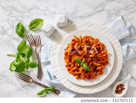 Penne pasta with sausage, mushrooms, tomato sauce Penne pasta with sausage, mushrooms, tomato sauce 142707113