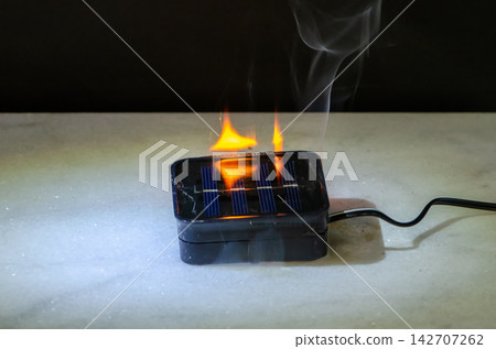 Damaged solar light device with residual smoke as risk of malfunction and fire consequences Damaged solar light device with residual smoke as risk of malfunction and fire consequences 142707262