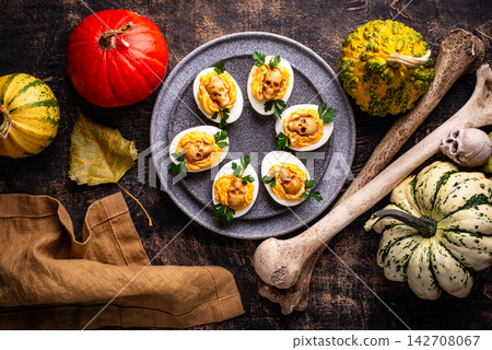 Deviled Eggs decorated with skull Deviled Eggs decorated with skull 142708067