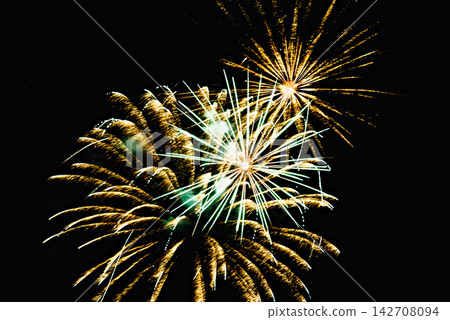 Fireworks lighting up the night sky. Pyrotechnics, abstract Fireworks lighting up the night sky. Pyrotechnics, abstract 142708094