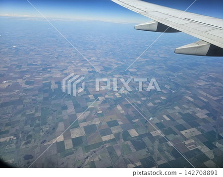 Wide Airplane Wing View Over Agricultural Landscape Between Buenos Aires and Cordoba 142708891