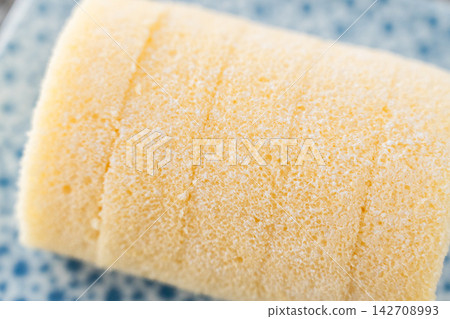 The fine, smooth sponge texture of the roll cake batter The fine, smooth sponge texture of the roll cake batter 142708993