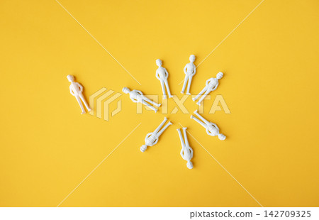 Workplace exclusion and outsider concept with one person left outside the team circle Workplace exclusion and outsider concept with one person left outside the team circle 142709325