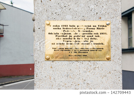 Nitra, Slovakia - May 26, 2024: Historical Plaque on Our Lady of Sorrows Monument Nitra, Slovakia - May 26, 2024: Historical Plaque on Our Lady of Sorrows Monument 142709443