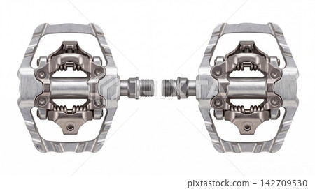 Pair of clipless mountain bike pedals with clipless mountain component equipment platform drivetrain accessory mechanic maintenance transport isolated industrial strength engineering Pair of clipless mountain bike pedals with clipless mountain component equipment platform drivetrain accessory mechanic maintenance transport isolated industrial strength engineering 142709530