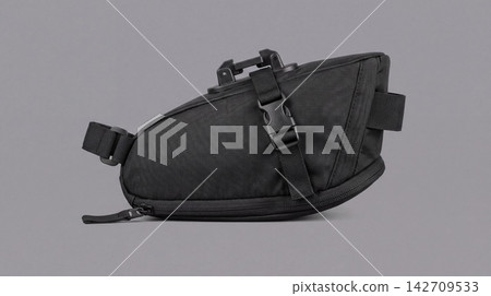 Black woven fabric saddle bag with adjustable buckle strap accessory transport equipment adventure fastening synthetic textured traveler commuter attachment container functional Black woven fabric saddle bag with adjustable buckle strap accessory transport equipment adventure fastening synthetic textured traveler commuter attachment container functional 142709533
