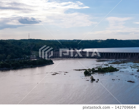 Aerial drone view of a large river hydroelectric power plant Aerial drone view of a large river hydroelectric power plant 142709664