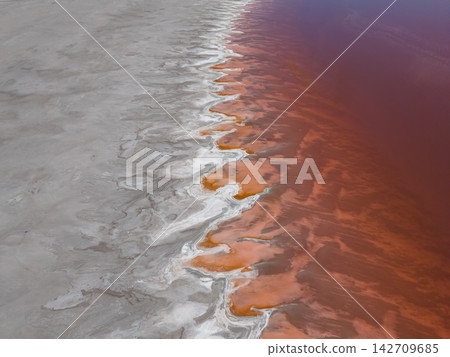 A drone view of the pink water at the Great Salt Lake in Utah A drone view of the pink water at the Great Salt Lake in Utah 142709685