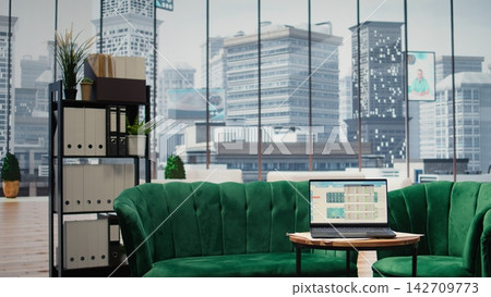 Empty global corporation office showcasing a green screen on laptop, modern workspace equipped with professional gadgets and networking system. Career development and motivation. Empty global corporation office showcasing a green screen on laptop, modern workspace equipped with professional gadgets and networking system. Career development and motivation. 142709773