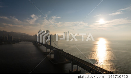 Aerial View of Gwangan Bridge, Marine City Skyline, and Dongbaekseom Island in Busan, South Korea Aerial View of Gwangan Bridge, Marine City Skyline, and Dongbaekseom Island in Busan, South Korea 142710720