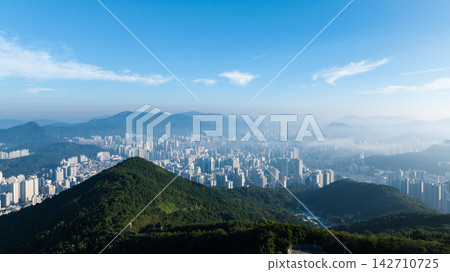 Aerial View of Gwangan Bridge, Marine City Skyline, and Dongbaekseom Island in Busan, South Korea 142710725