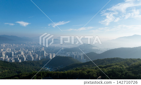 Aerial View of Gwangan Bridge, Marine City Skyline, and Dongbaekseom Island in Busan, South Korea Aerial View of Gwangan Bridge, Marine City Skyline, and Dongbaekseom Island in Busan, South Korea 142710726