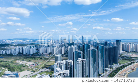 Aerial view of Songdo International City skyline and Incheon Bridge in South Korea Aerial view of Songdo International City skyline and Incheon Bridge in South Korea 142710758