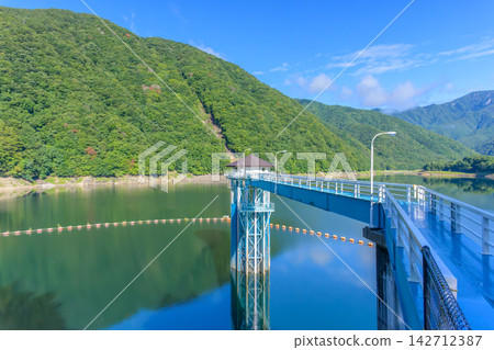 A view of Lake Hirose and the intake tower of Hirose Dam (Yamanashi City, Yamanashi Prefecture) A view of Lake Hirose and the intake tower of Hirose Dam (Yamanashi City, Yamanashi Prefecture) 142712387