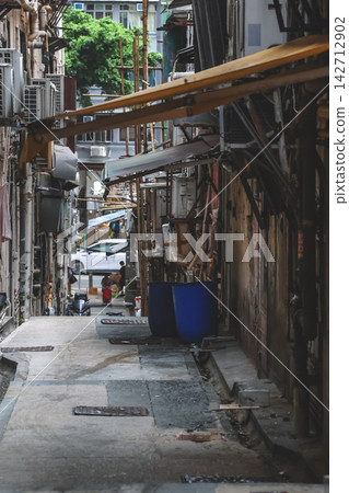 Hong Kong Aug 29 2026 alleyway behind residential buildings in Fung Tak Hong Kong Aug 29 2026 alleyway behind residential buildings in Fung Tak 142712902
