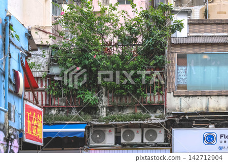 Hong Kong Aug 29 2026 Old residential tenement buildings at Fung Tak Hong Kong Aug 29 2026 Old residential tenement buildings at Fung Tak 142712904