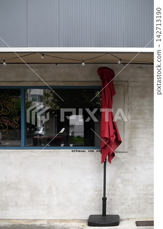 Store entrance and parasol 142713190