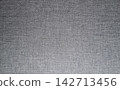 Soft grey baric texture with vertical gradient fade with subtle uniform crosshatch weave pattern background 142713456