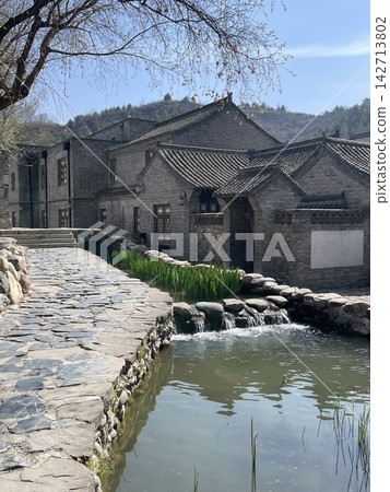 Traditional Stone Architecture And Stream In Gubei Water Town Beijing Traditional Stone Architecture And Stream In Gubei Water Town Beijing 142713802