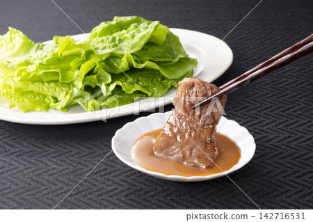 A rich miso sauce that coats grilled meat A rich miso sauce that coats grilled meat 142716531