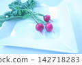 Radishes served on a white plate 142718283