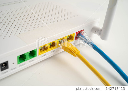 Ethernet cable with wireless router connect to internet service provider network. Ethernet cable with wireless router connect to internet service provider network. 142718413
