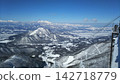 Snowy mountains seen from the ski resort 142718779