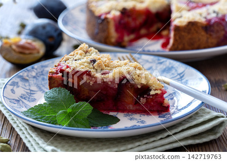 Piece of traditional German plum pie. Piece of traditional German plum pie. 142719763
