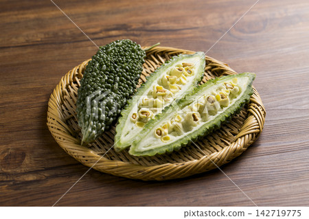 Bitter melon cut in half 142719775