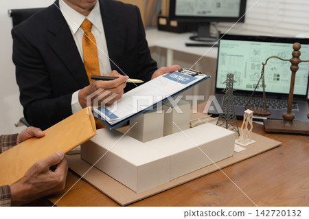 Construction Law and Sustainable Building Planning with Solar House Model and Legal Scale. Construction Law and Sustainable Building Planning with Solar House Model and Legal Scale. 142720132