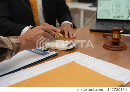 Concept of construction law, real estate development, renewable energy housing, and engineering collaboration. 142720134