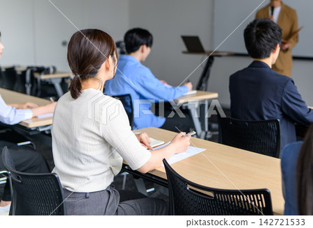 Participants listening to a lecture at a seminar Participants listening to a lecture at a seminar 142721533
