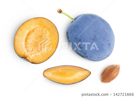 fresh blue plum with half and slices isolated on white background. Top view. Flat lay fresh blue plum with half and slices isolated on white background. Top view. Flat lay 142721668